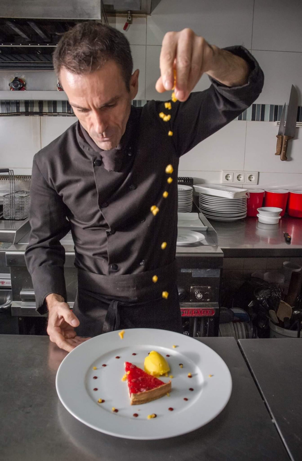 Chef plating a dessert